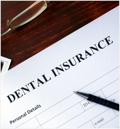 Dental insurance form on desk