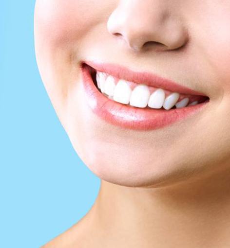 Close-up of woman’s smile with white, beautiful teeth