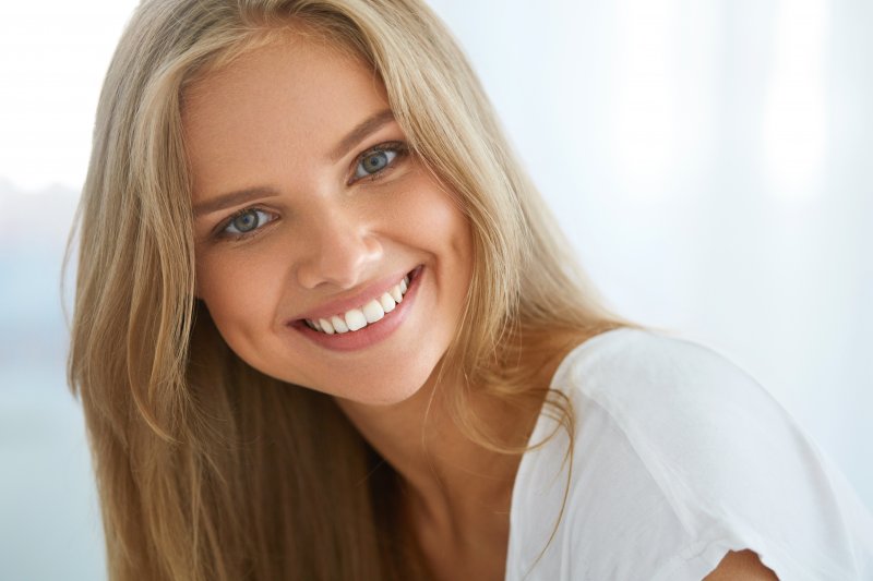 closeup of woman smiling with veneers